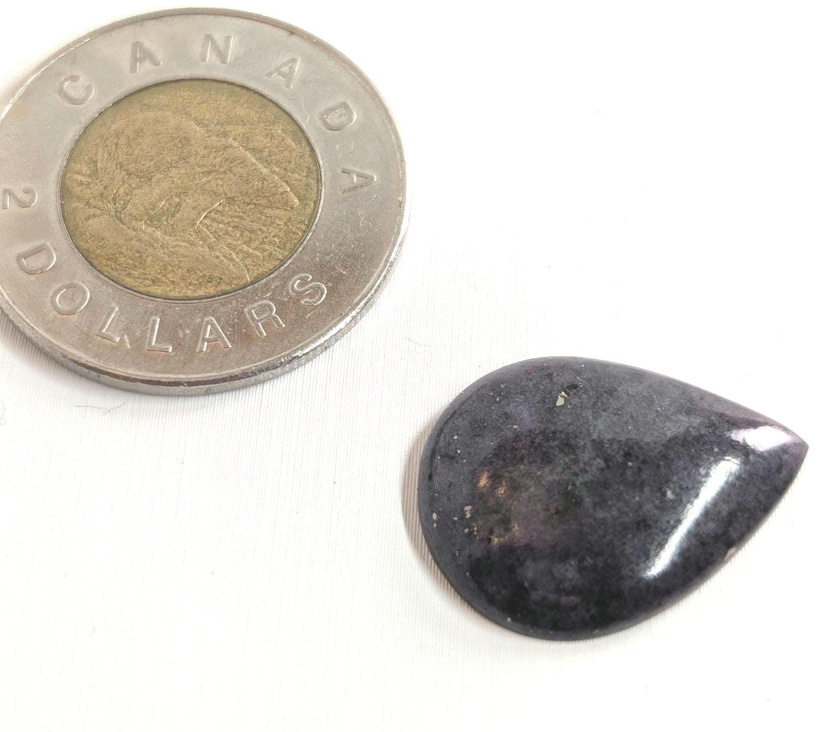 Corundum-Sapphire Cabochon, 24 x 22 mm, Pear, from Newfoundland and Labrador, Canada
