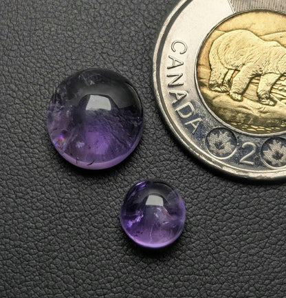 Two Round Amethyst Cabochons, from Newfoundland and Labrador, Canada