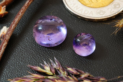 Two Round Amethyst Cabochons, from Newfoundland and Labrador, Canada